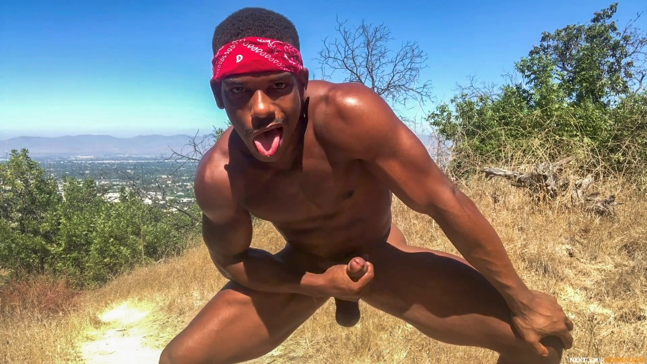 Stunning black gay Adrian Hart flaunts his huge prick and hot muscles outdoors  
