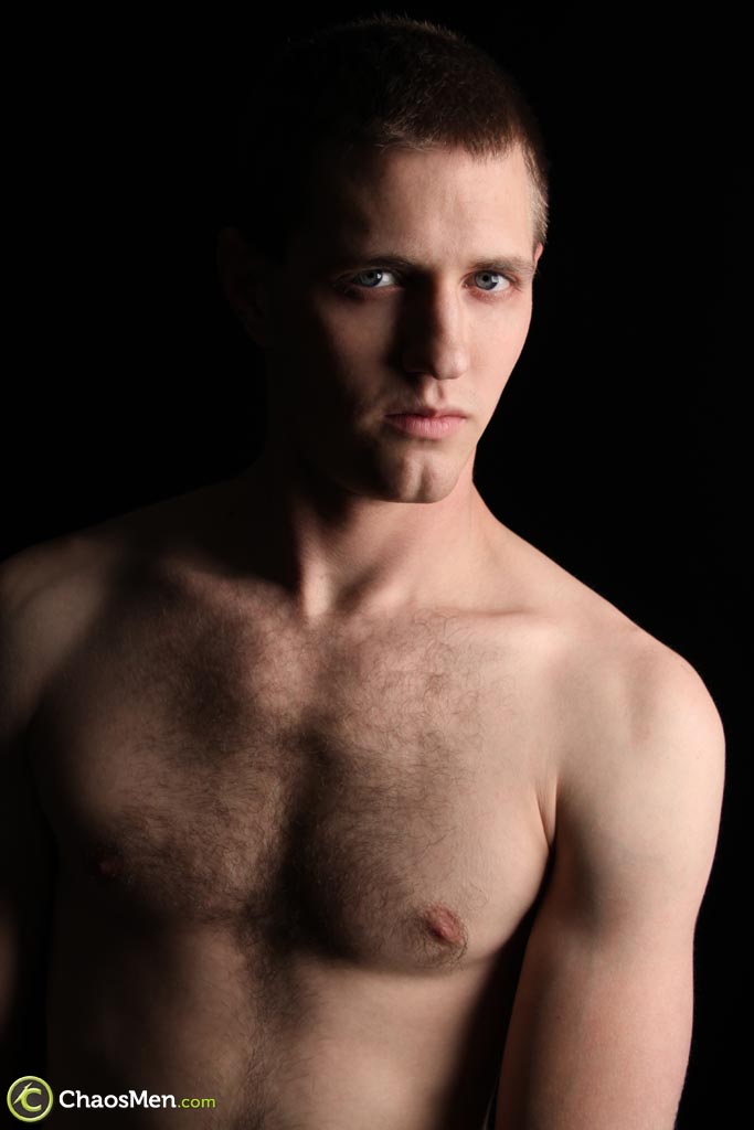 Slender gay model Oliver exposing his hairy chest and  