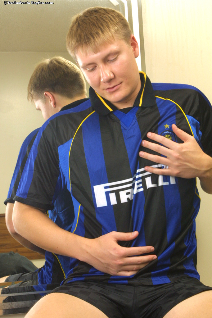 Gay soccer player Halo strips off his uniform and strokes his fat dick  