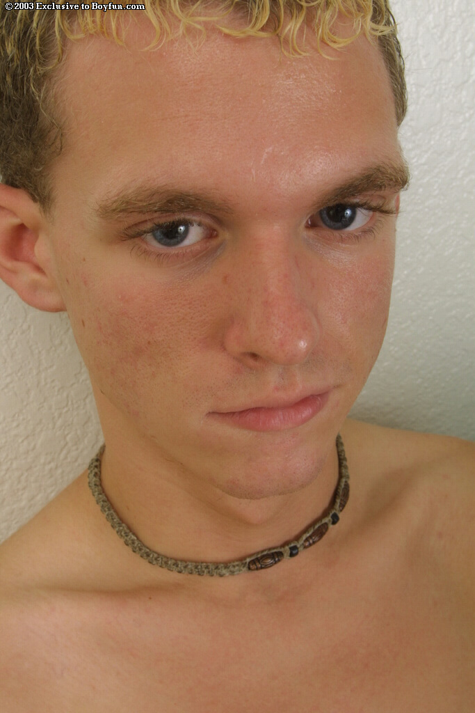 Blonde gay Darrin shows his shaved balls up close  