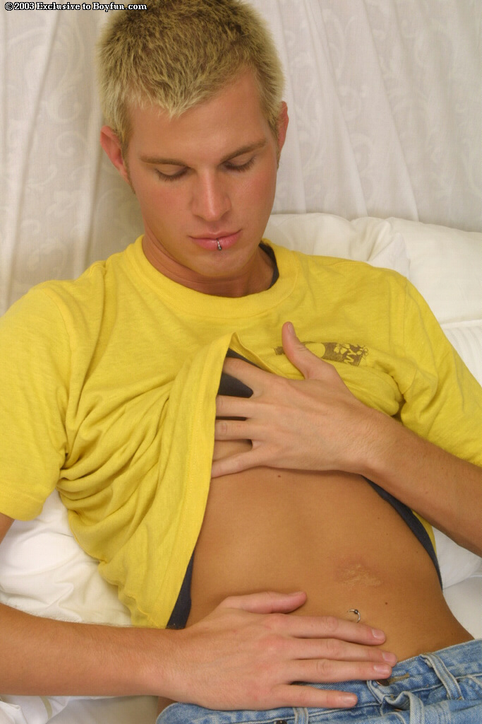 Gay blonde hottie Caleb shows his pierced nipples & masturbates  