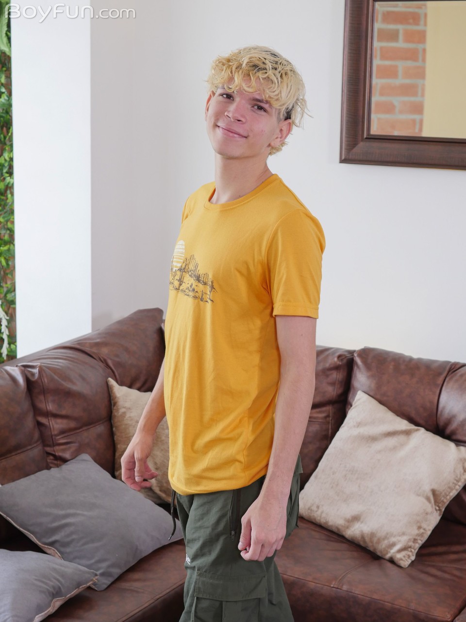 Cute blond twink Melo Prince doffs his pink undies and pulls out his fat dick  