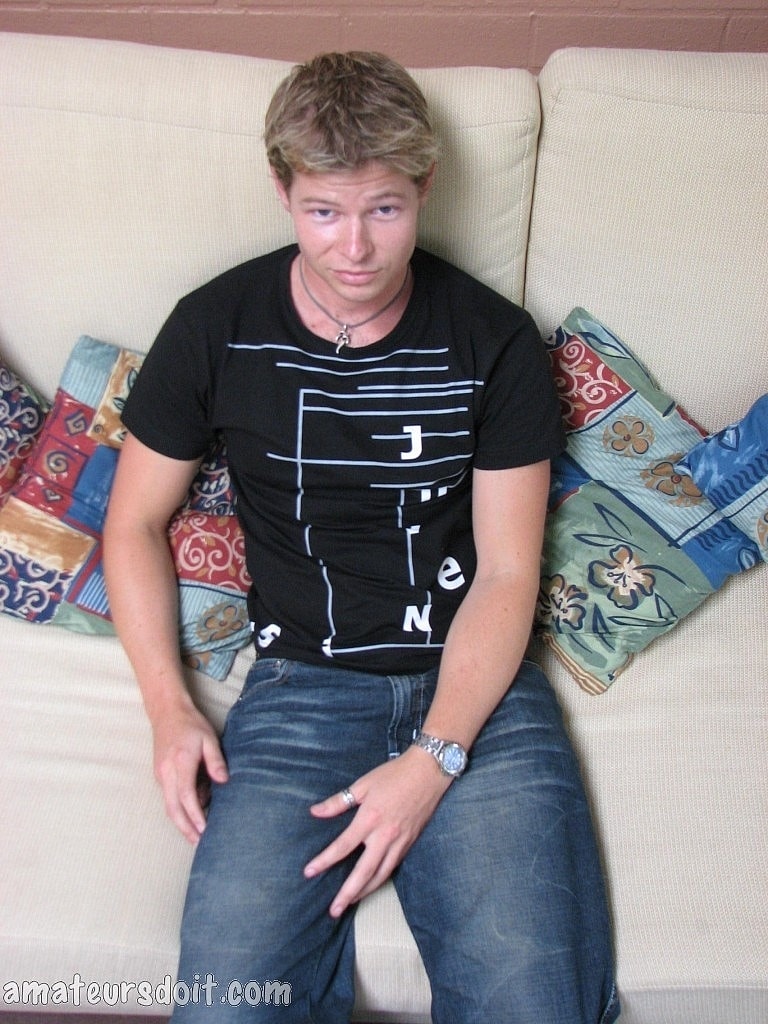 Blonde gay Paul Pounder strips completely naked and jerks off on the couch  